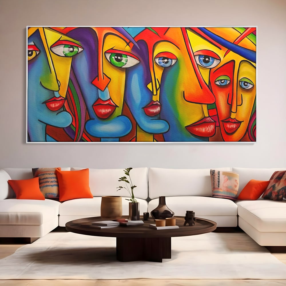 Tablou canvas cu tablou canvas cu fete abstracte colorate, in rama de aluminiu argintiu, pe perete intr-un living